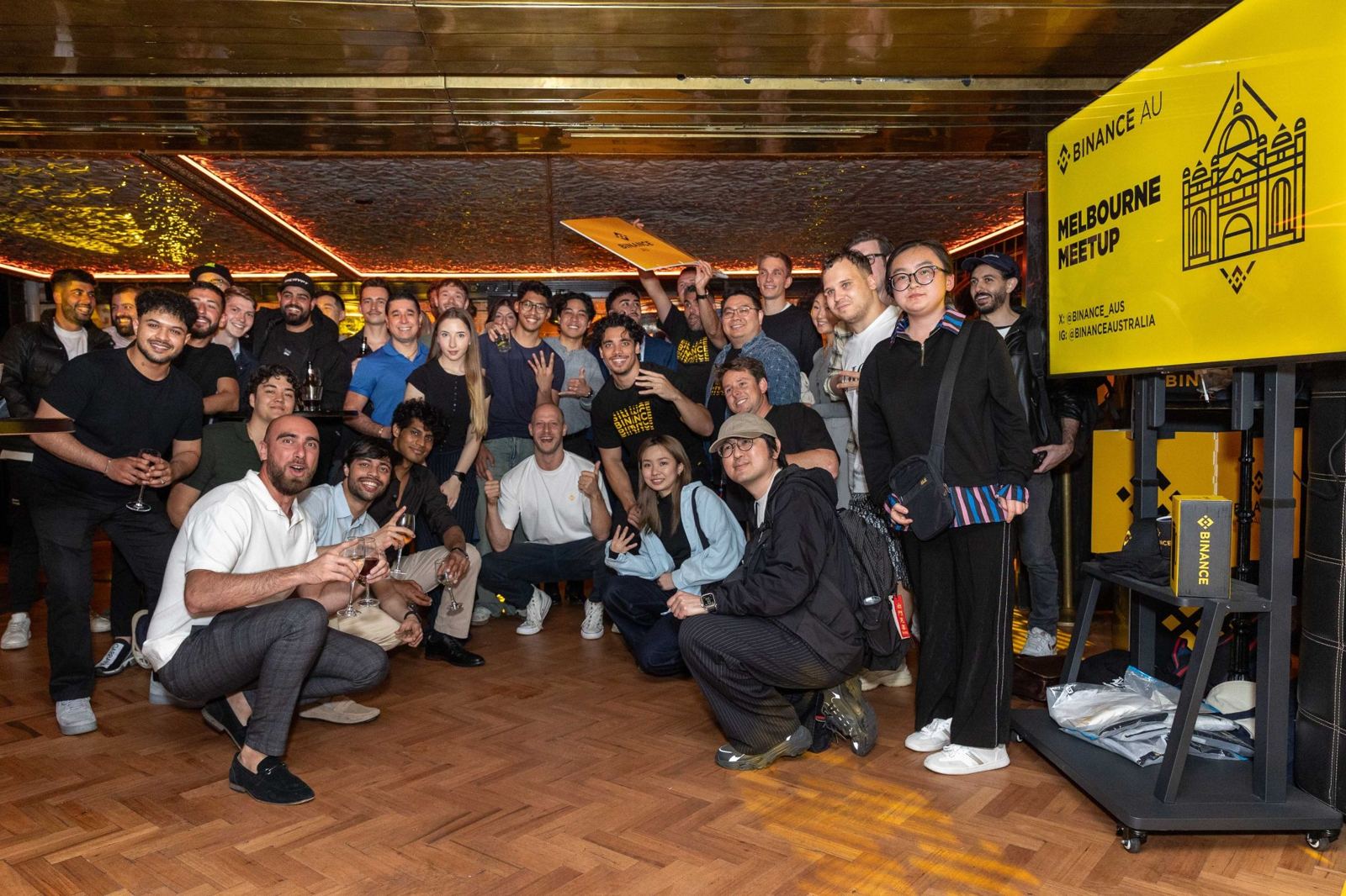 Group photo at a Binance Australia meetup in Melbourne